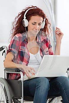 disabled happy woman enjoying music