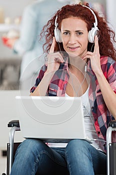 disabled happy woman enjoying music