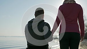 Disabled love, invalid person with girl, couple of lovers, on wheel chair,