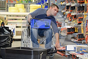 Disabled man in hardware store