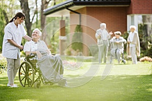 Disabled man in the nursing home garden