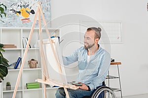 Disabled man painting