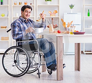 Disabled man preparing soup at kitchen