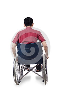 Disabled man sitting on wheelchair