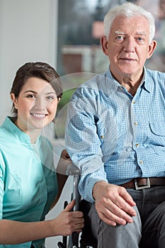 Disabled man and social welfare worker