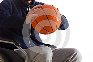 Disabled man throwing basketball