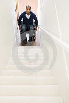 Disabled man trapped at bottom of stairs