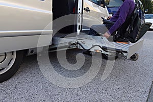 Disabled Man on Wheelchair going in his car