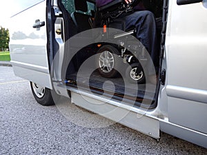 Disabled Man on Wheelchair going in his car