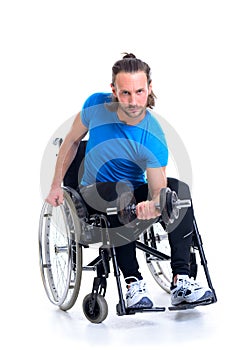 Disabled man in wheelchair train with bar-bell