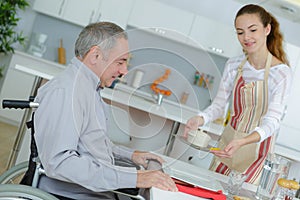 disabled man having breakfast