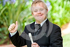 Disabled musician doing thumbs up.