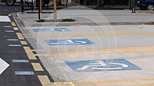 Disabled parking detail on a city street photo