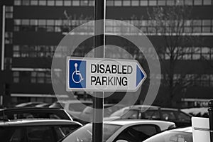 Disabled parking sign at a car park