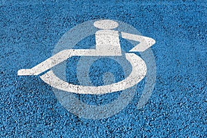 Disabled parking only sign on the floor