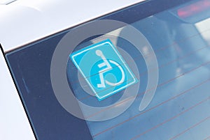 Disabled parking sticker tag on car