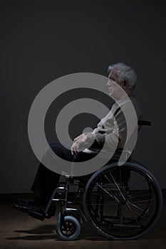Disabled pensioner using wheelchair