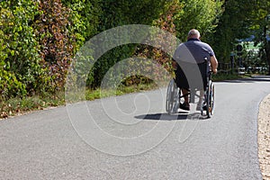 disabled person with little dog and motor wheel chair