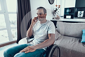 Disabled Person in Wheelchair Talking Phone