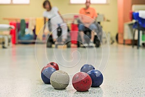 Disabled persons playing Boccia