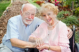 Disabled Senior Couple Outdoors