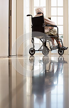 Disabled Senior Woman In Wheelchair