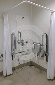 Disabled shower cubical in changing room.