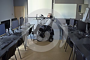 Disabled student in class room.