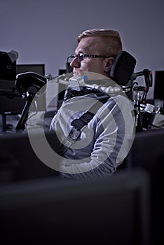 Disabled student working with his computer.