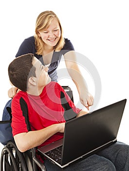 Disabled Teen and Friend on Computer