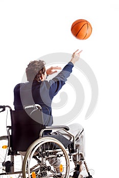 Disabled throwing basketball