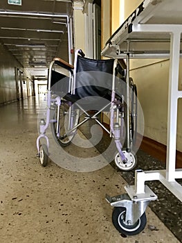 Disabled wheelchair for transportation of not walking patients.