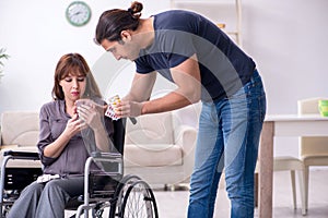 Disabled wife and young husband at home