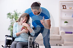 Disabled wife and young husband at home