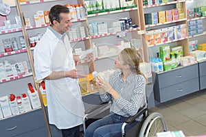 Disabled woman at pharmacy
