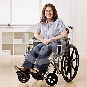 Disabled woman sitting in laptop