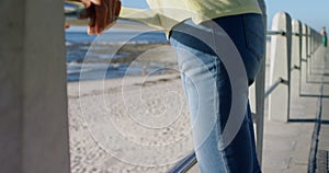 Disabled woman standing in the beach 4k