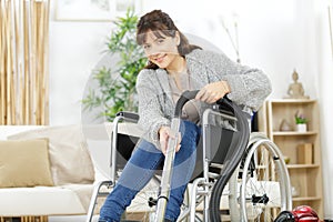 disabled woman using vacuum cleaner