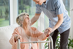 Disabled woman using walker