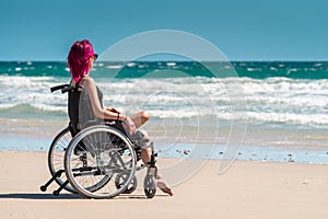 Disabled woman in the wheelchair