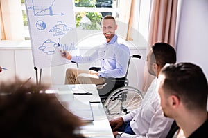 Disabled Businessman Giving Presentation