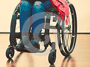 Disabled young girl on wheelchair.