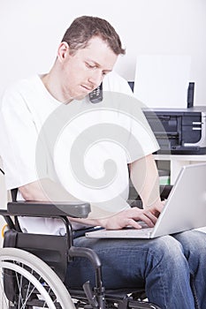 Disabled young man at the office