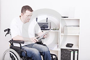 Disabled young man at the office