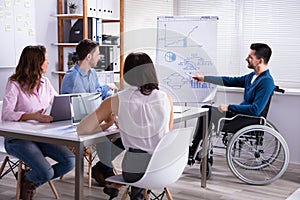 Disables Businessman Giving Presentation