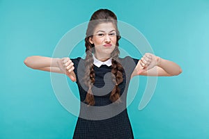 Disagree young woman demonstrate dislike sign. photo