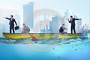 Disagreement concept with businessmen rowing in different direct