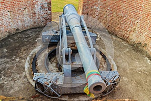 Disappearing carriage gun at Phi Sua Samut Fort, the public place in Thailand. Disappearing carriage gun is an obsolete type