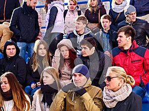 Disappointed fans on tribune. Loss of their favorite team.