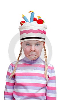 Disappointed girl in ridiculous cap
